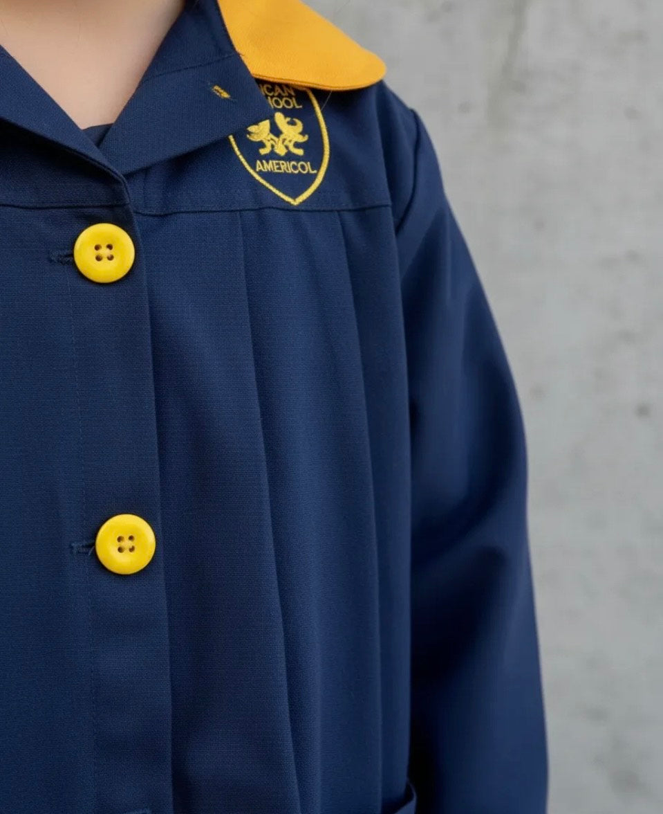 DELANTAL ESCOLAR COLEGIO ROYAL AMERICAN SCHOOL