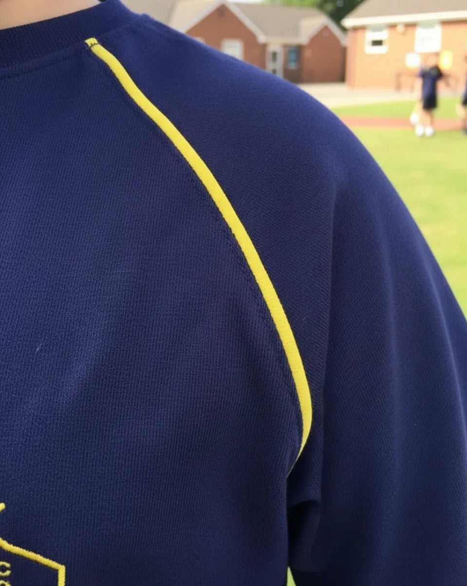 POLERA ESCOLAR DE ALGODON COLEGIO ROYAL AMERICAN SCHOOL